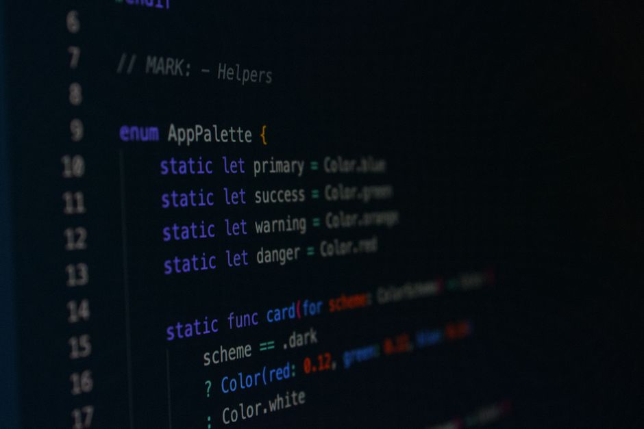 Macro photography of color palette code in a programming environment.