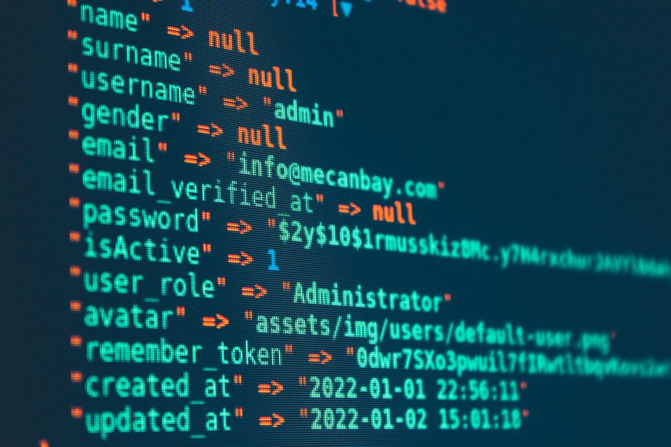 Vibrant close-up of code displayed on a monitor with various programming details.