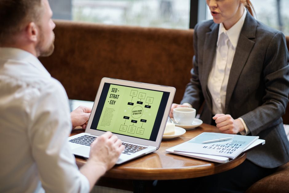 A laptop displaying an analytics dashboard with real-time data tracking and analysis tools.